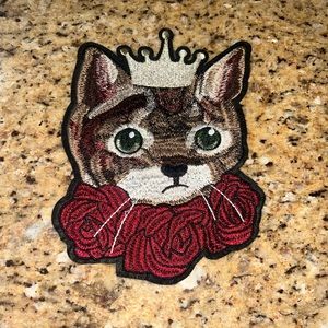 Large Cat With a Crown on a Bed Of Roses Embroidered Iron On Patch